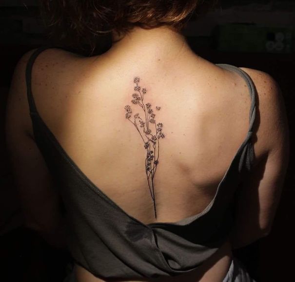 красивая женская татуировка на спину